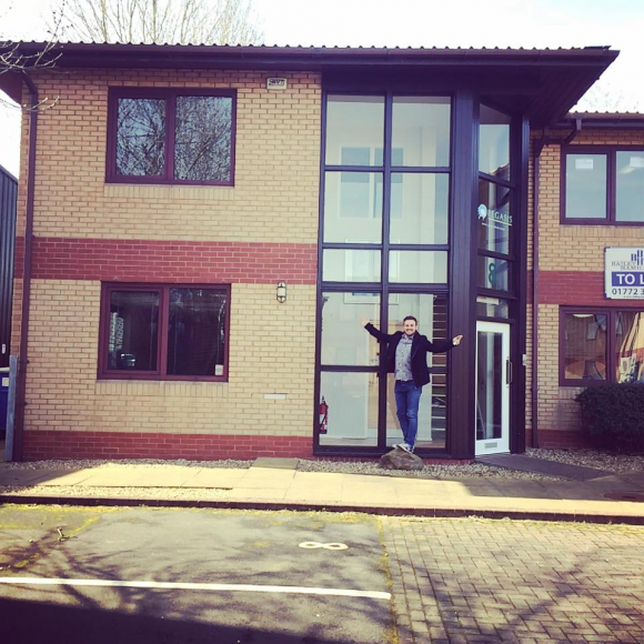 Here's a photo of the day we moved in with our Director Daniel in front of the building.<br />
<br />
We've now replaced the previous company's logo with our own.