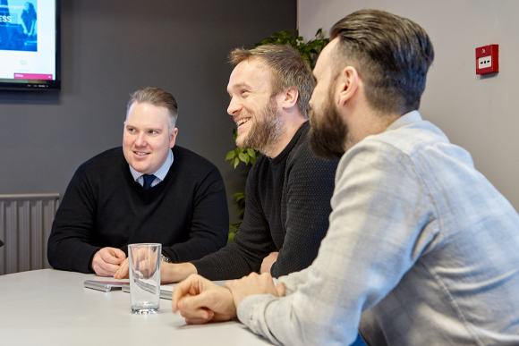 Ryan, Dave and Jon talking all things business in our meeting room.