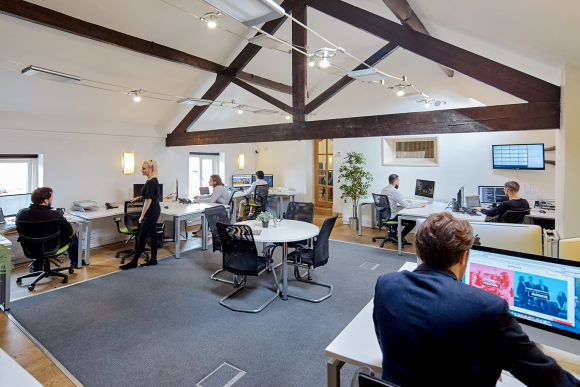 Our newly re-furbished design studio and its team hard at work monitoring, updating and developing client websites.